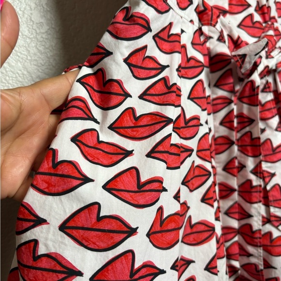Anthropologie Red Smooch Dress. All Over Red Lip Design. Button Front. Pockets. - Picture 2 of 16